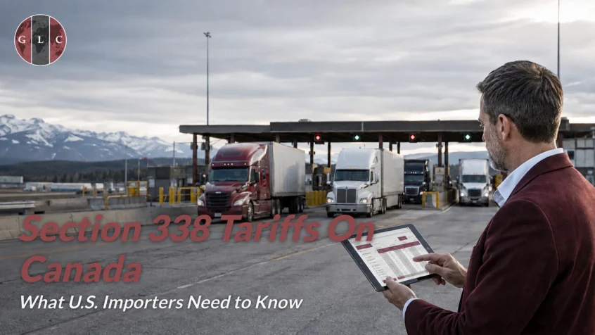 U.S.-Canada border crossing with commercial trucks and a logistics professional reviewing Section 338 tariff and customs information on a tablet.