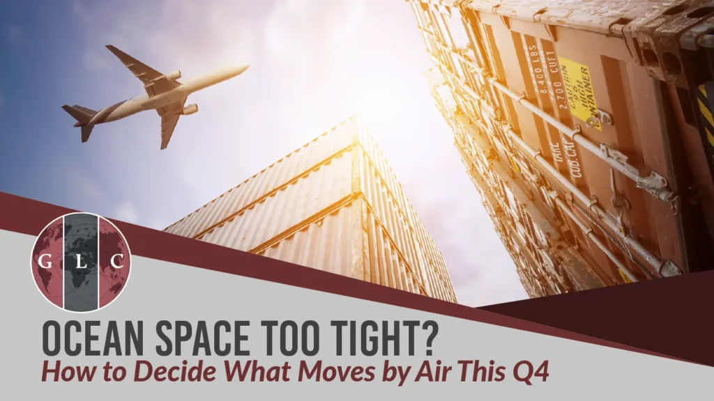 Cargo plane flying over stacked shipping containers at a port, showing the choice between ocean and air freight in Q4.